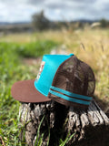 Dusty Diamonds Western Feather Bow Trucker Cap